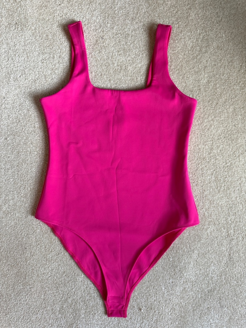 Women’s Pink One-Piece Bodysuit